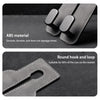 Close-up of a black ABS material hook and loop strap designed for car seat back storage.