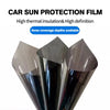 A close-up view of three layers of dark tint film rolled up for car sun protection.