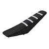 Black motorcycle seat cover protector with white stripes on a dark fabric.