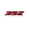 A close-up view of a 3D metal car fender side and trunk decal with the number 392 in red and black.