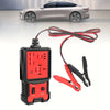 A black automotive relay tester with a red test button and wires, shown next to a silver car.