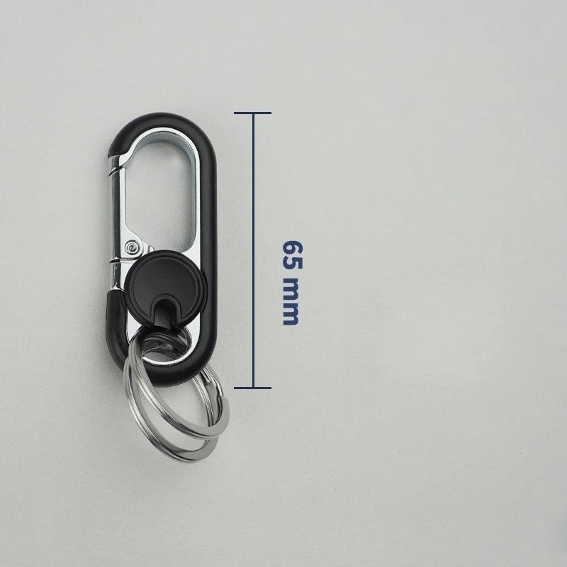 A black rotatable lock carabiner keychain with a measuring scale indicating 65 mm.