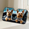 A dog-themed car windshield sunshade featuring two small, fluffy terrier dogs.