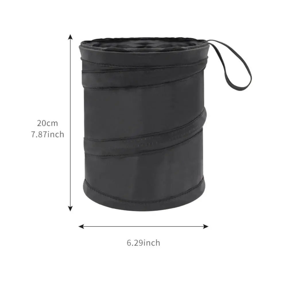 A black waterproof collapsible car trash can bag with a drawstring closure.