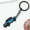 A black chain keychain featuring a blue classic alloy car design.