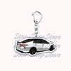 Silver acrylic keychain featuring a detailed model of a white sports car.