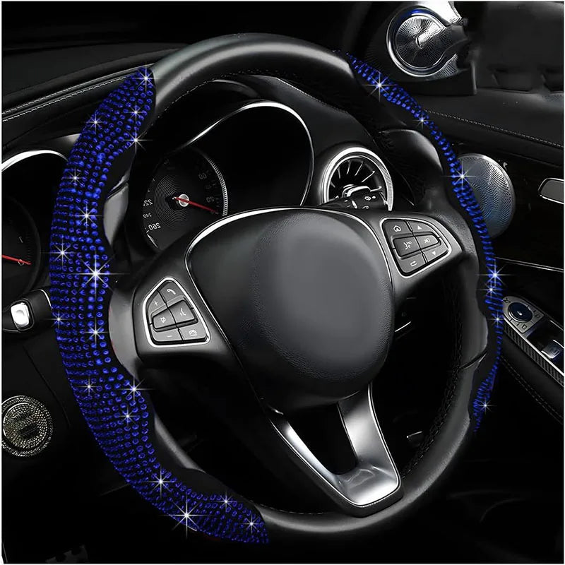 Volant noir avec des lumières en forme de diamant bleues illuminant la poignée en cuir et les rayons.