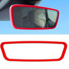 Red silicone edge protector for a vehicle's rearview mirror.