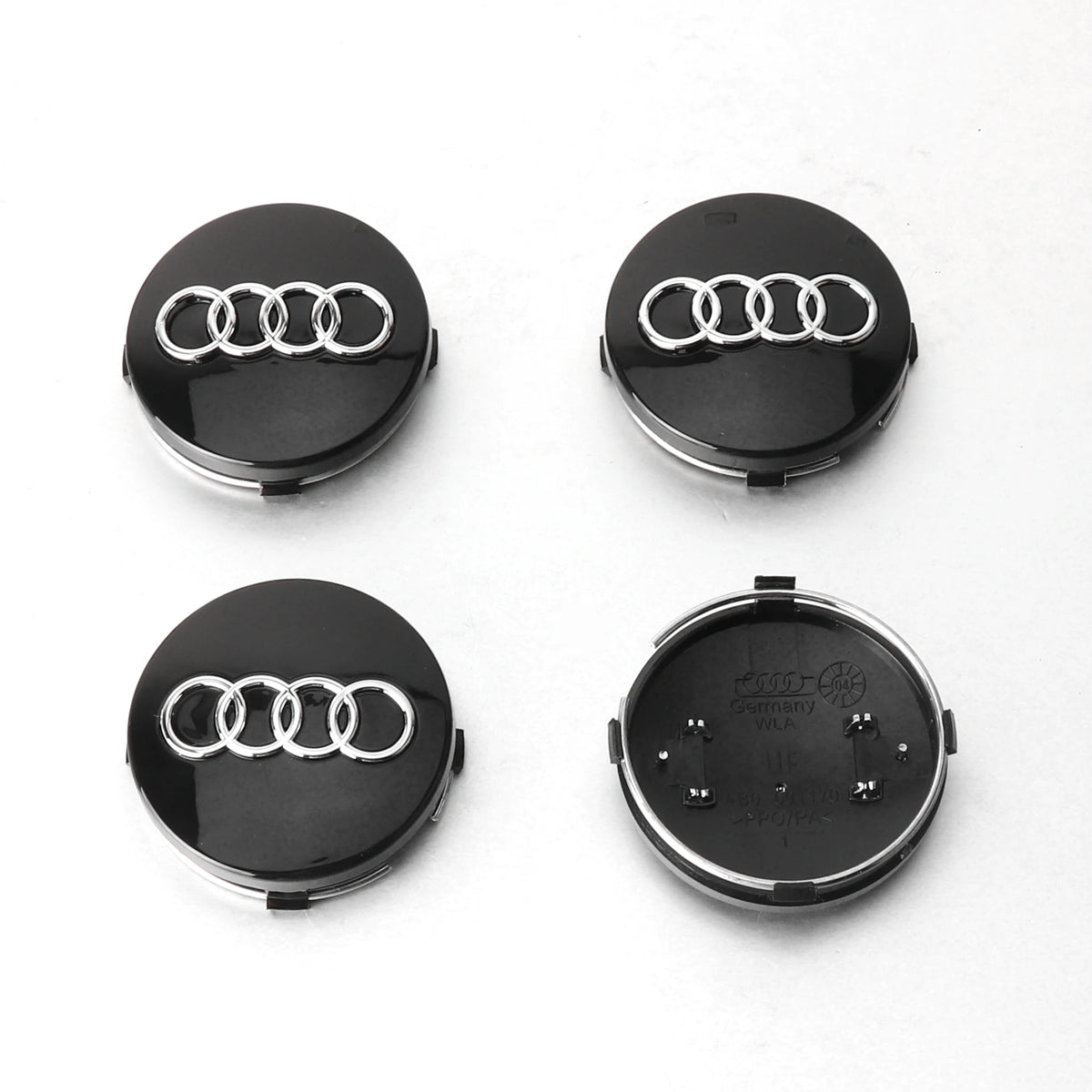 Cuatro tapas centrales decorativas para Audi y Porsche, con tres anillos entrelazados.