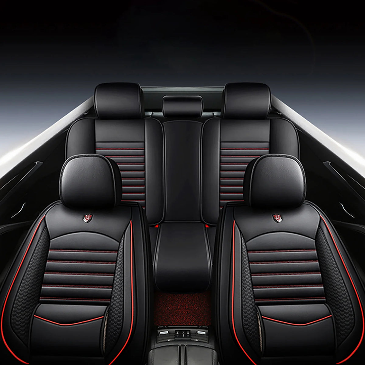 Interior view of a car with black leather seats and red stitching, showing universal seat covers.