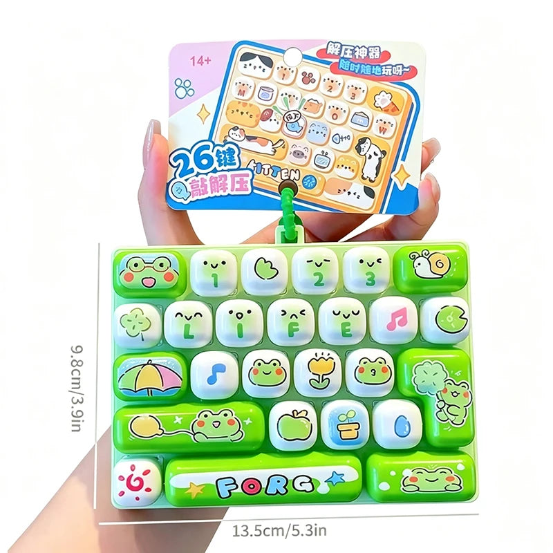 A green keycap stress relief button set with various cartoon characters and symbols is shown being held by a hand.