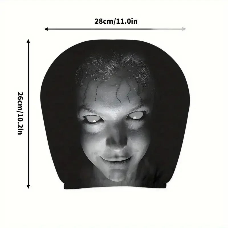 A black silicone car headrest cover shaped like a face with lightning bolt details.