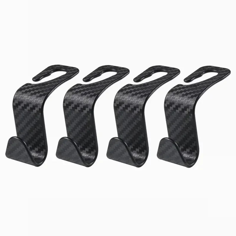 A set of black carbon fiber universal car seat back headrest storage hooks.