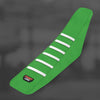 A green universal motorcycle seat cover with white stripes on a dark gray background.