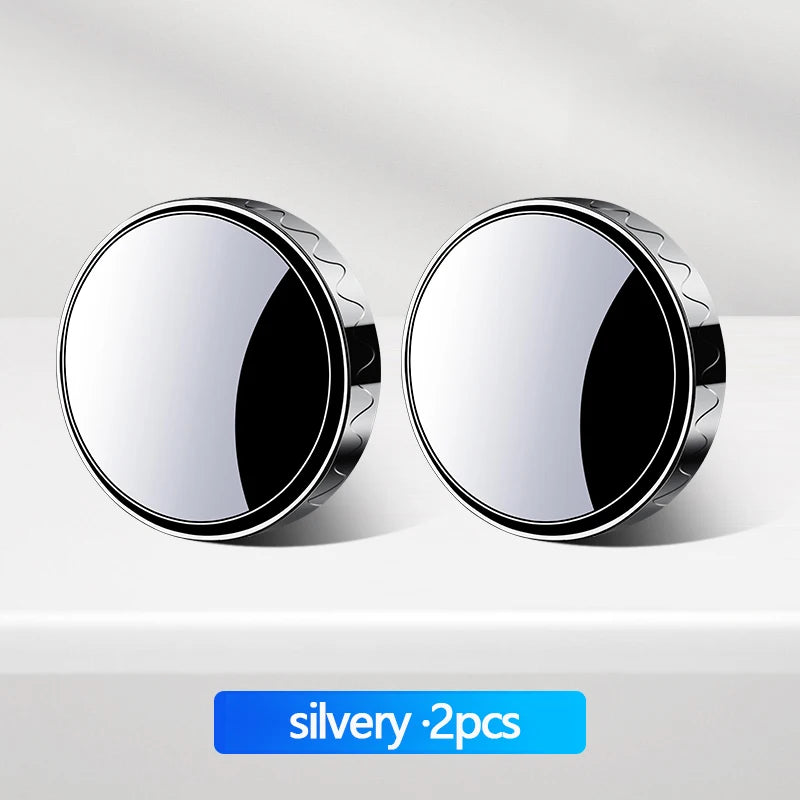 Two silvery 360° rotatable car blind spot mirrors displayed on a white surface.