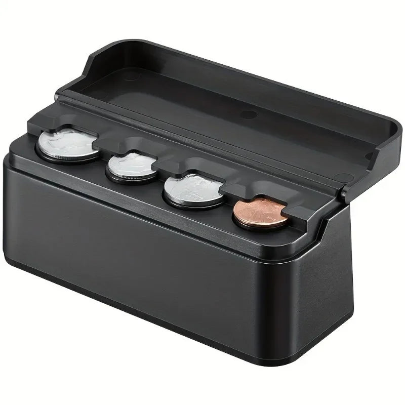A black universal coin storage box with four slots for holding coins.