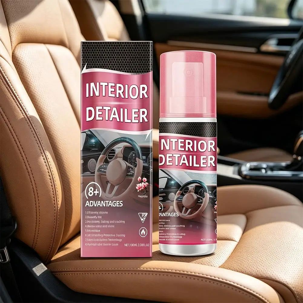 A bottle of Interior Detailer spray next to its packaging in a car interior setting.