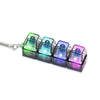 A set of five colorful LED keyboard keychains with a silver chain.