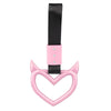 Pink heart-shaped handle accessory with a black strap and pink plastic mount