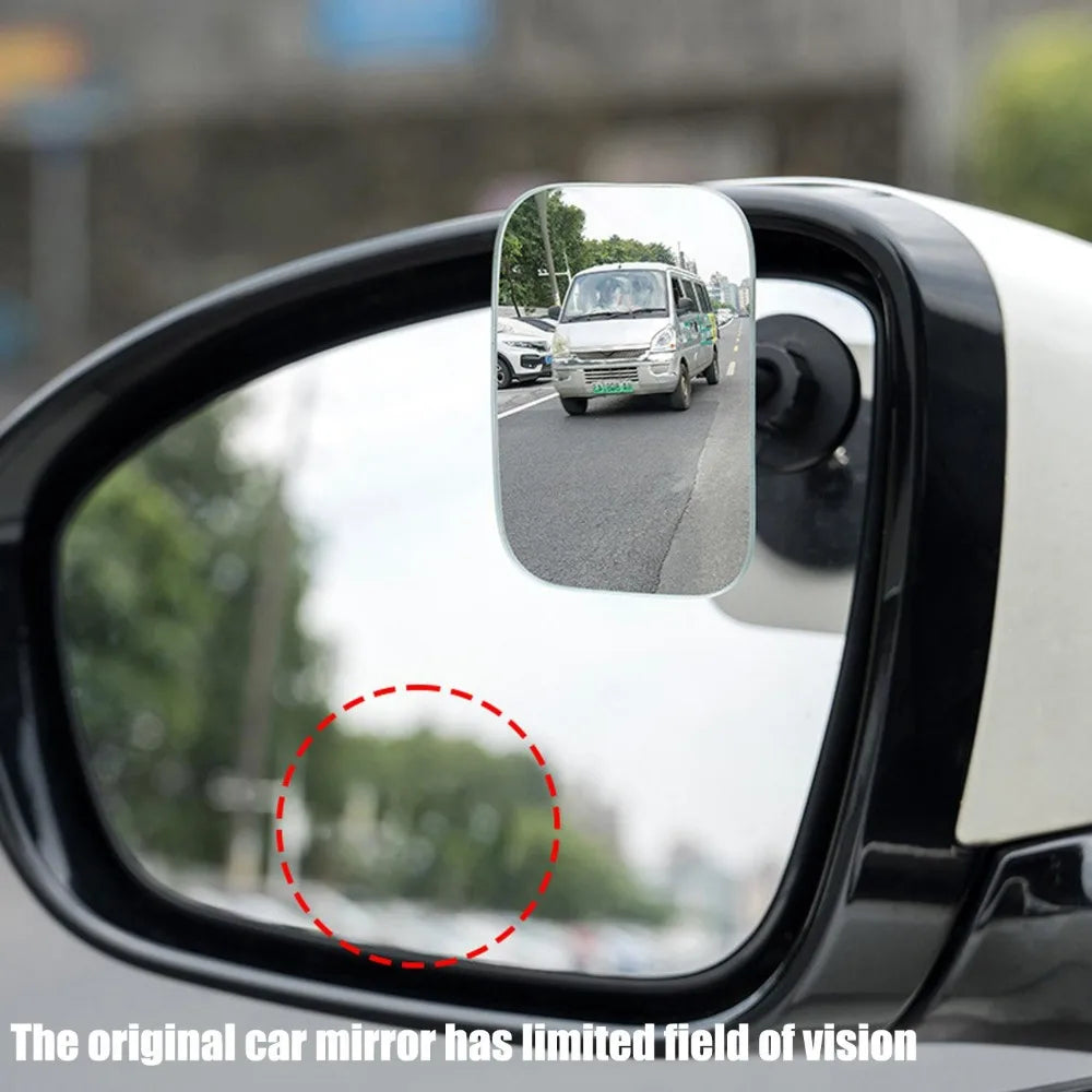 A close-up view of a car's side mirror showing a vehicle in the reflection, highlighting the limited field of vision.