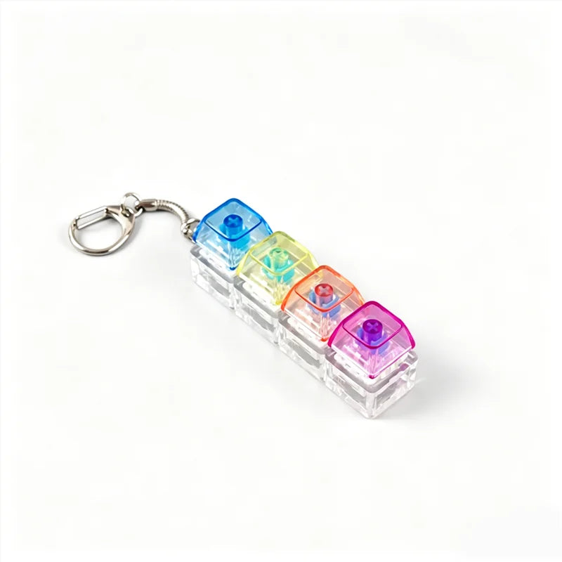 A clear plastic keychain featuring multiple colorful LED fidget toys attached to a metal ring.