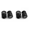 Three black aluminum car wheel valve caps are shown in a row.