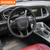 A black steering wheel decoration cover is shown inside a car, featuring a leather-wrapped grip and controls.