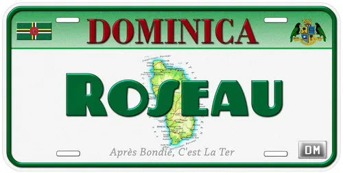 A green and white license plate design featuring the name Dominica and Roseau with a map of the island.