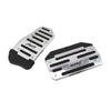 A set of aluminum pedal covers for a sports pedal, featuring textured and smooth surfaces.