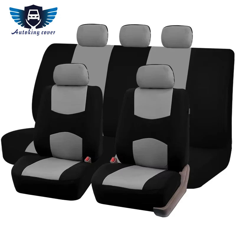 A set of black and gray universal fabric car seat covers for a vehicle.