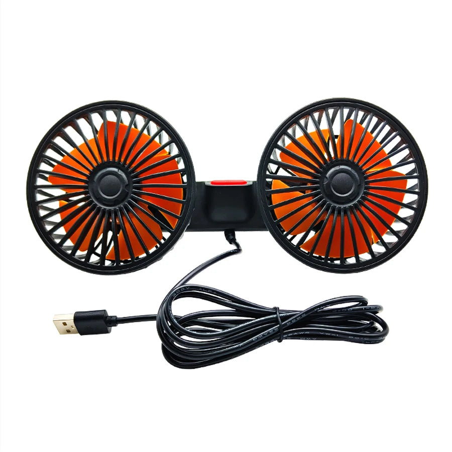 A black car cooling fan with two orange blades and a flexible cord.