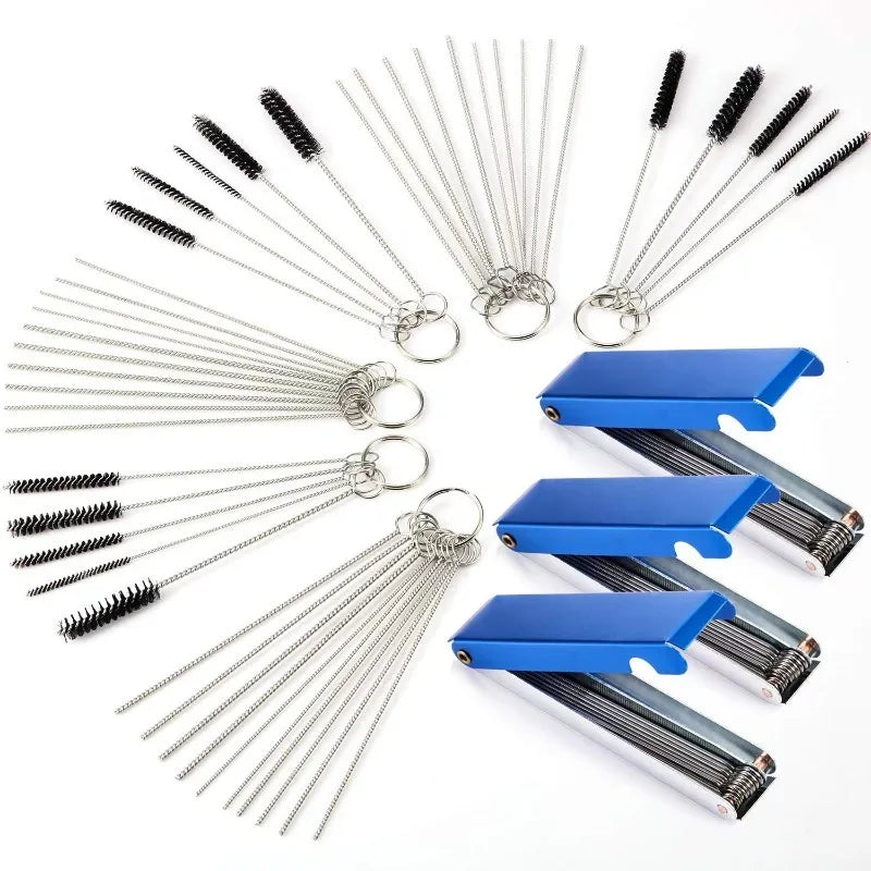 A set of metal tools for carburetor cleaning and maintenance, featuring various wire and blade attachments.