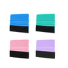 Four felt squeegee tools in blue, teal, pink, and purple, showing different colors for vinyl decal removal.