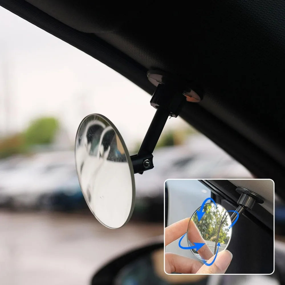 A 360° adjustable HD blind spot mirror mounted on a car door frame.