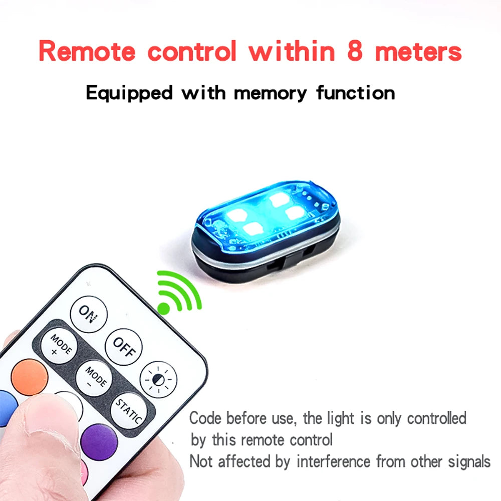 A blue remote control for car ambient interior lights is shown next to a smartphone remote.