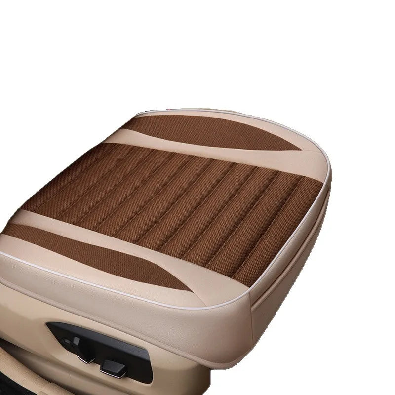 Close-up view of flax breathable car seat covers with brown and beige textured upholstery.