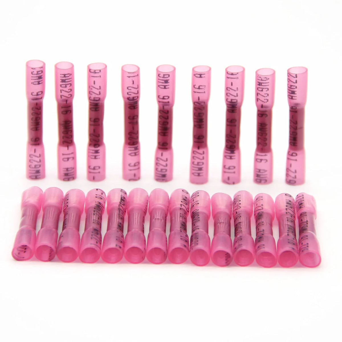 A row of pink heat shrink wire connectors with various sizes and insulation types displayed horizontally.