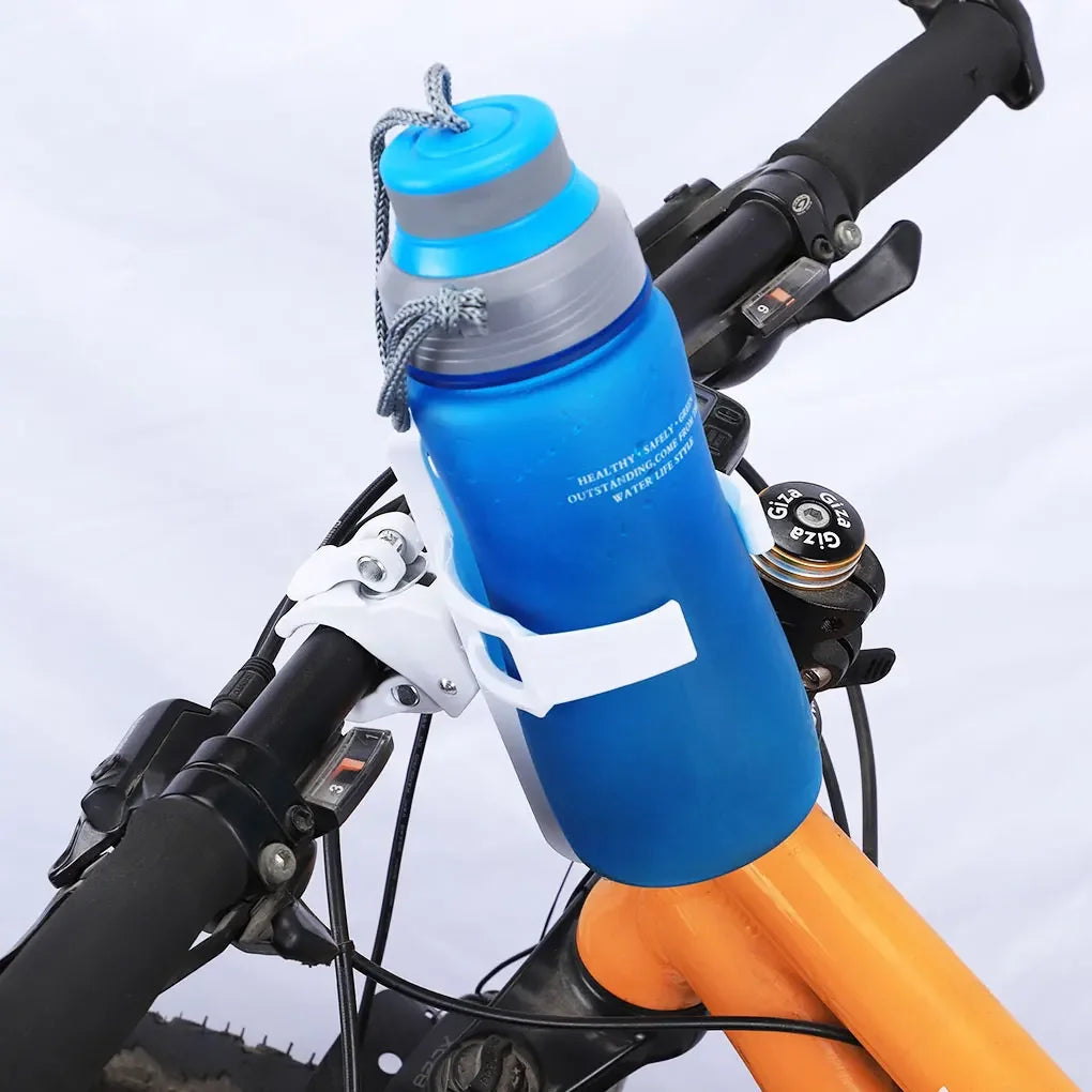 A blue water bottle is mounted on a black bicycle frame using a rotatable cage.
