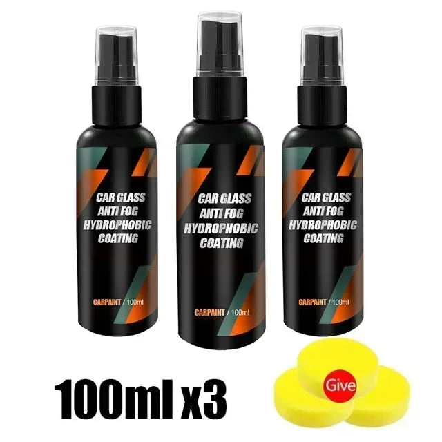 Three black glass spray bottles with yellow caps and labels for car glass anti fog hydrophobic coating