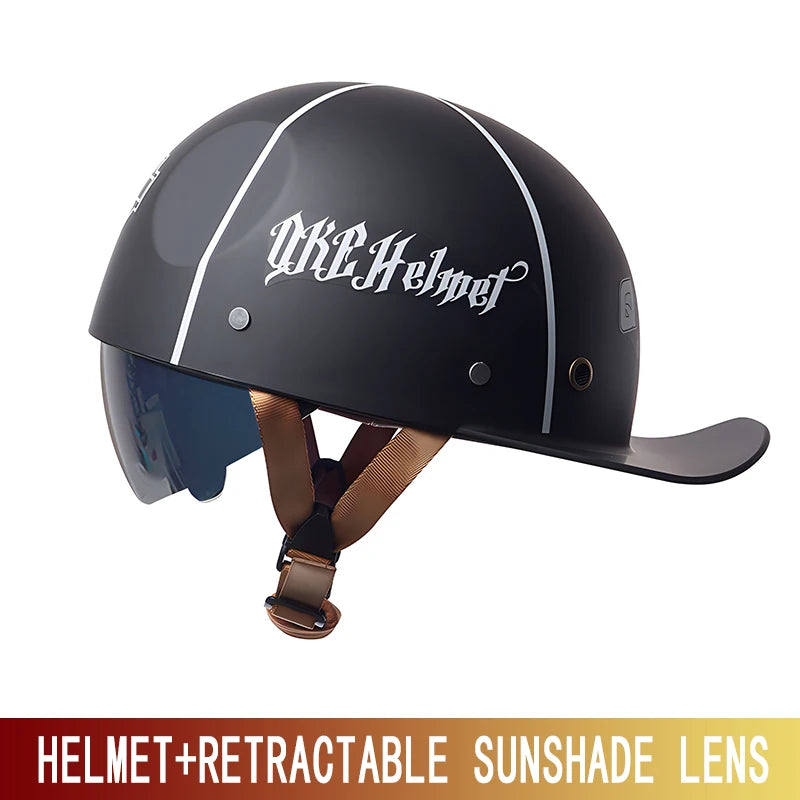 A black retro half helmet with a white decal and a retractable sunglass lens attached.