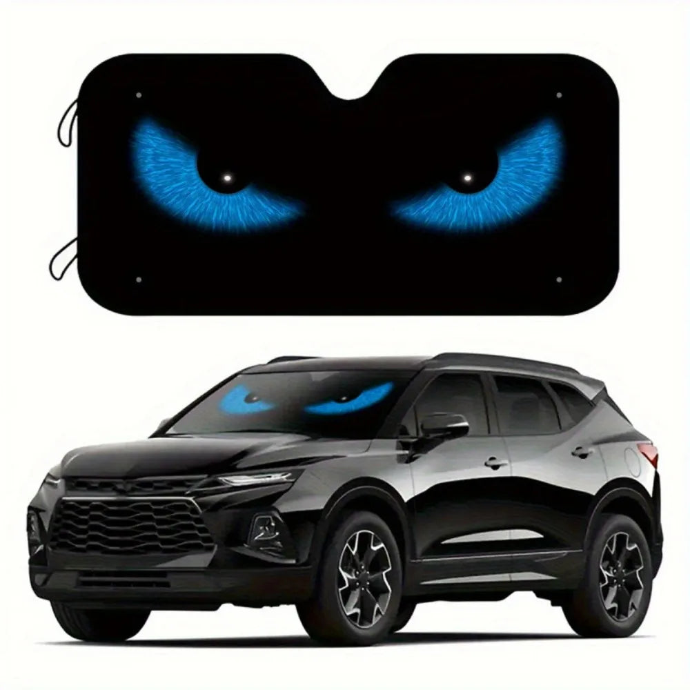 A black SUV with a foldable windshield sun shade installed, featuring glowing blue eyes on the shade.