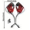 A set of universal motorcycle rear view mirrors with red grips and chrome mounting hardware.