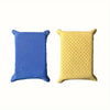A pair of anti-fog glass and mirror cleaning sponges, one blue and one yellow.