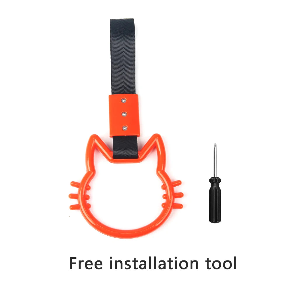 Black strap with an orange hand pull ring and a metal tool for installation