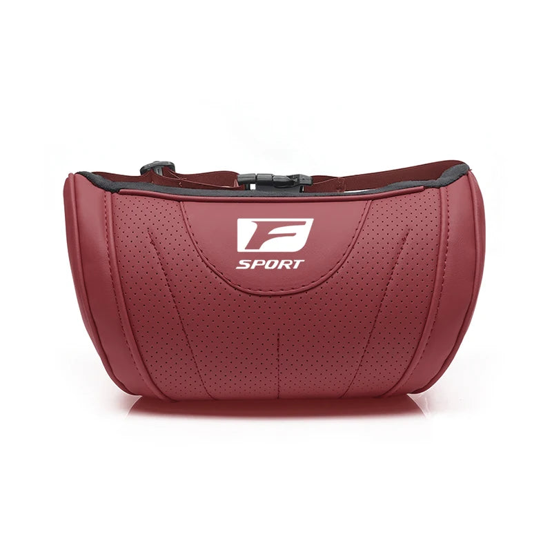 A maroon ergonomic auto logo neck pillow with a textured surface and black strap.
