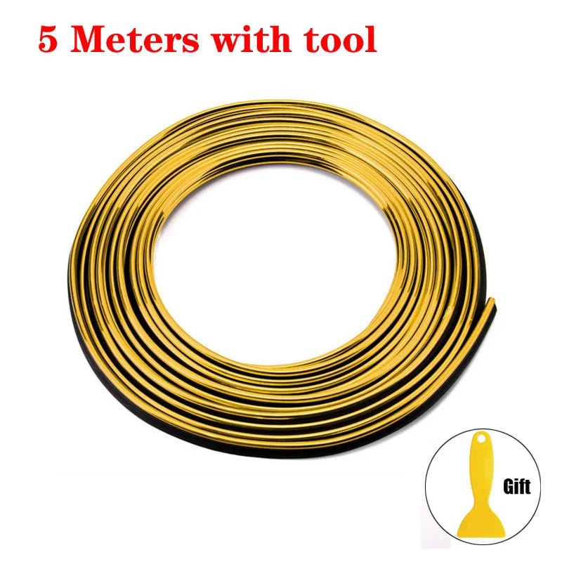 A coil of 5 meters of gold-colored universal car molding trim strips with a tool.