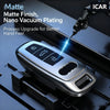 A close-up of a silver car key case cover being plated with a blue light by an Icar tool.