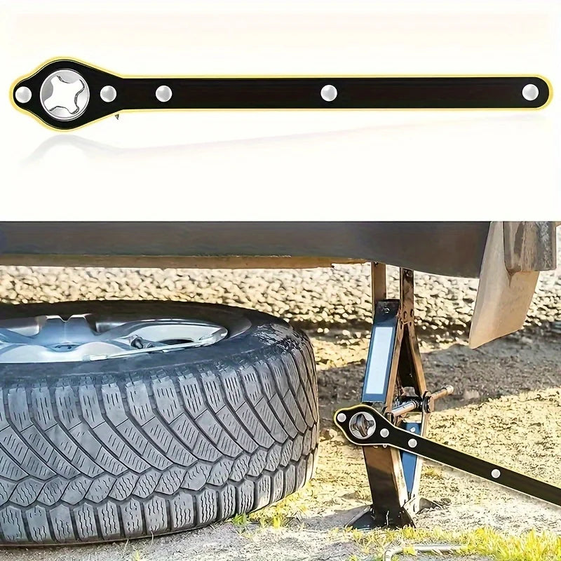 A black heavy-duty ratchet wrench with a star-shaped opening is shown next to a tire and jack.