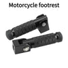A black motorcycle footrest with textured grip and mounting plate.