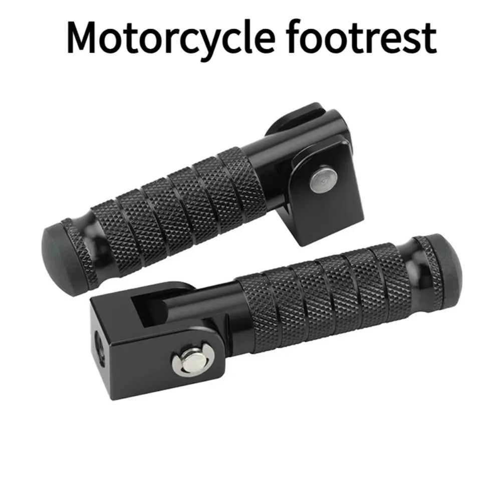 A black motorcycle footrest with textured grip and mounting plate.